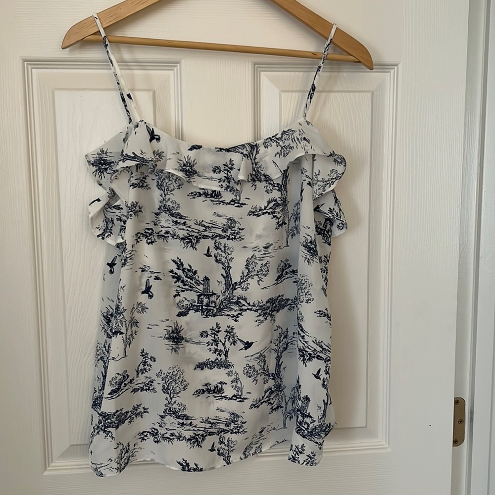 Women's tank top, Bar III size L, blue and white toile pattern. Ruffle trim.